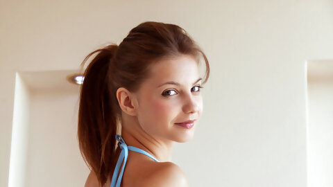 Adorable teen with a ponytail Emma Sweet flaunts her shaved pussy