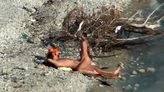 Couple fucking on a public beach, while walking past people