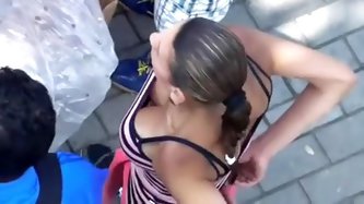 Down blouse on street